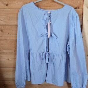 Boutique Tie Front Peplum Top